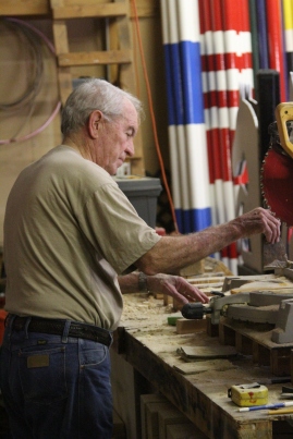 Mike Christian, 75, cleans his work space in his workshop in Fort Worth, Texas, on Sept. 18, 2013. Christian started managing horse shows for the U.S. Equestrian Federation and the American Quarter Horse Association, judging and building jumps after retiring from the corporate world 20 years ago.(TCU/Bethany Peterson)