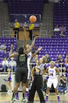 TCU's Latricia Loving jumps for the tip of at the start of the game against Baylor at the Daniel-Meyer Coliseum on February 22, 2014. (Bethany Peterson/TCU)