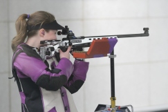 Kelly Bogart aims her smallbore rifle in the standing position in the match against the Air Force Academy at TCU on February 22, 2014. (Bethany Peterson/TCU)